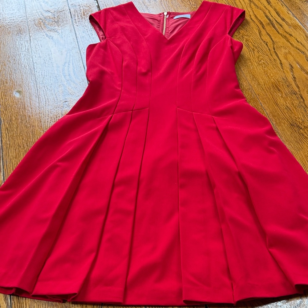 Calvin Klein red A-Line V-Neck sleeveless dress.  Lined. Size 10. Good condition